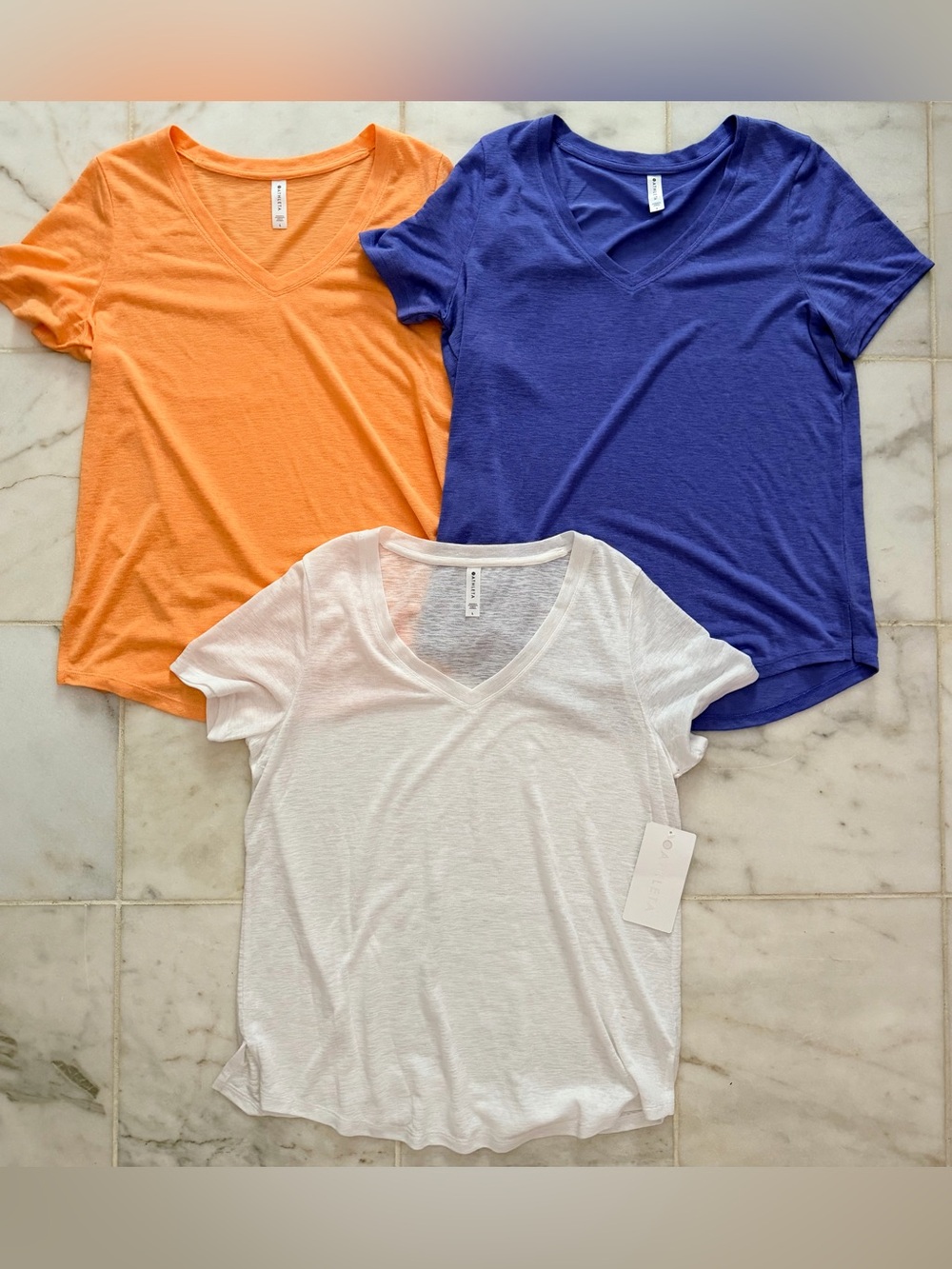 Three Athleta Women’s Size Large V-Neck Lieghtweight Tops